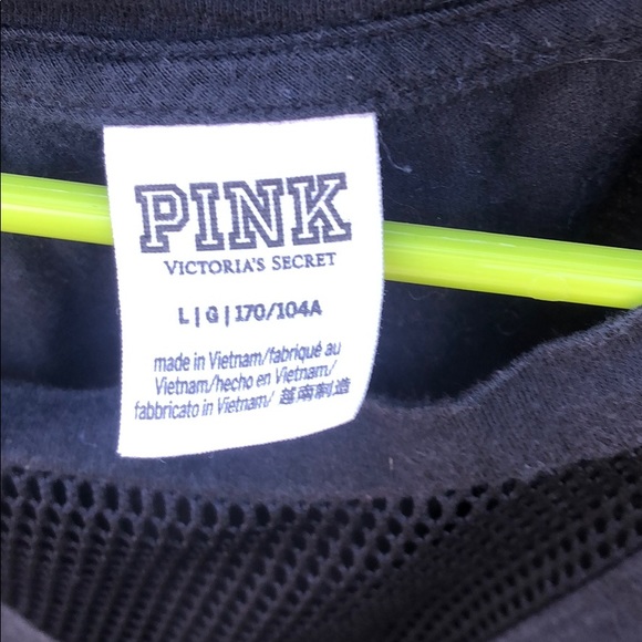 Workout shirt it has a few bleach spots - Picture 2 of 4